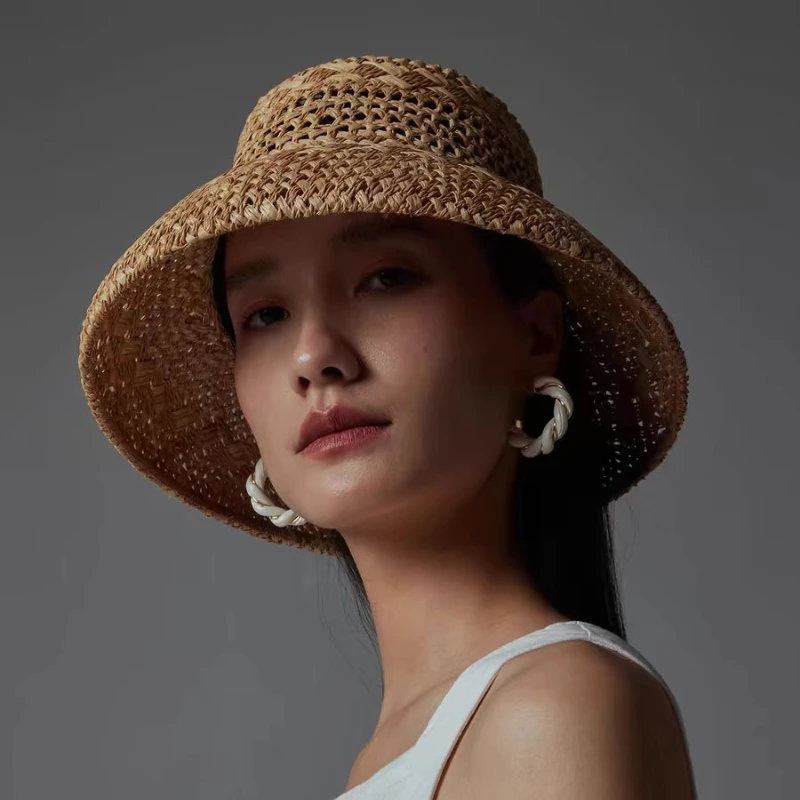 kf-S5f9e7171744547ceaaa62288f85810a9c 2025 새로운 프랑스어 복고풍 스타일 통기성 중공 라피아 태양 모자 숙녀 여름 여행 패션 오목 탑 밀짚 모자 모자 도매 - 이미지 1
